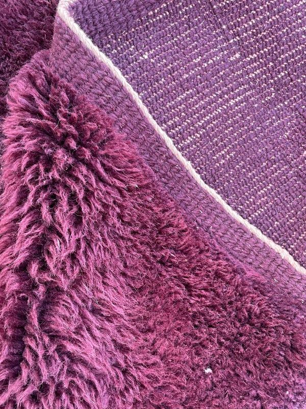Dos du tapis, rangées de nœuds visibles